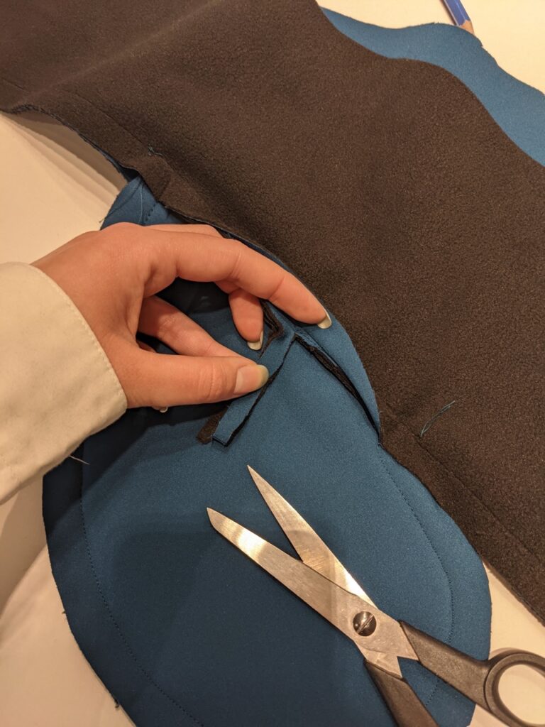 Trimming down seam allowance on a pocket