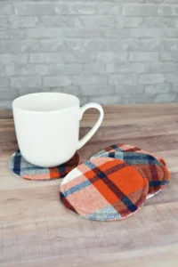 plaid sewn coasters with a white mug sitting on top.