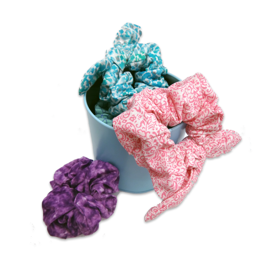 Pink , Blue and Purple sewn scrunchies in a jar.