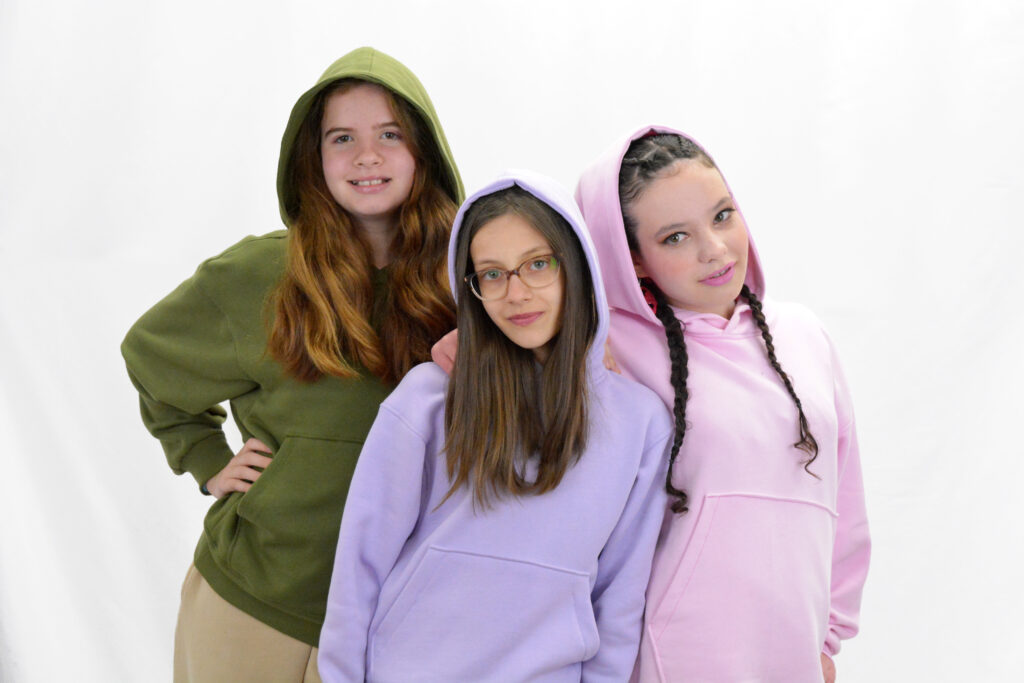 Sewing students wearing the dropped shoulder hoodie sewing pattern